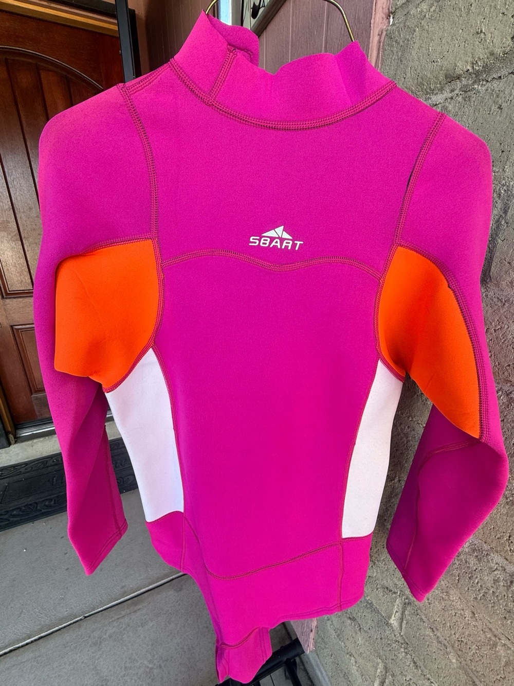 SBART Women's Magenta, orange, and white paneled long sleeved shortie wetsuit